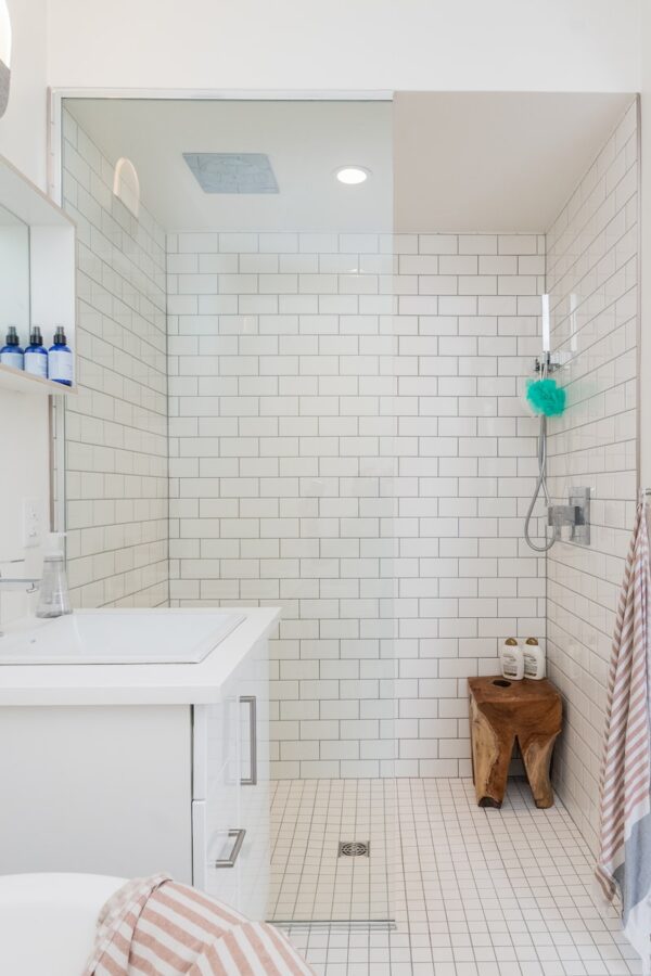 white ceramic sink near white ceramic sink